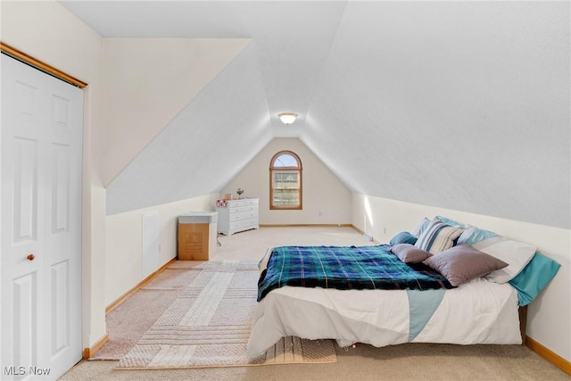 1925 N Lipkey Rd, North Jackson, OH 44451 - bedroom with carpet, lofted ceiling, and baseboards