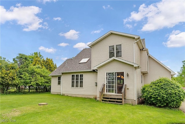 1925 N Lipkey Rd, North Jackson, OH 44451 - rear view of house with a yard, entry steps, and roof with shingles