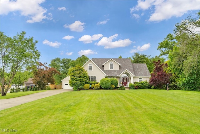 1925 N Lipkey Rd, North Jackson, OH 44451 - view of front of home with a front lawn, concrete driveway, and a garage