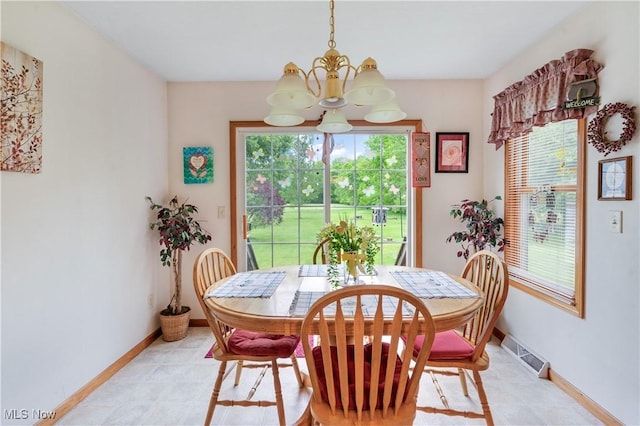 1925 N Lipkey Rd, North Jackson, OH 44451 - dining area featuring a chandelier, plenty of natural light, and baseboards