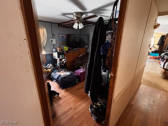 bedroom featuring a ceiling fan and light wood-style floors