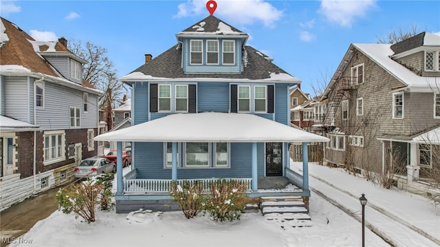 1496 E 107th St, Cleveland, OH 44106 - traditional style home featuring covered porch and roof with shingles