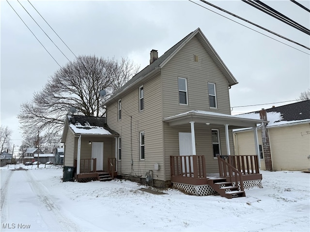 view of front of house with a chimney