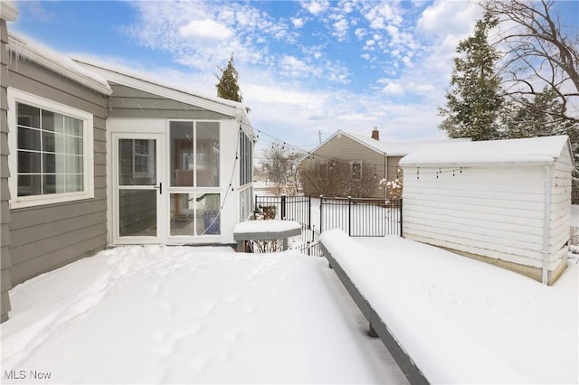 view of snow covered patio