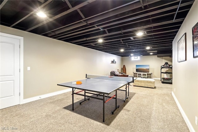 playroom with carpet floors and baseboards