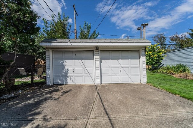 detached garage with fence