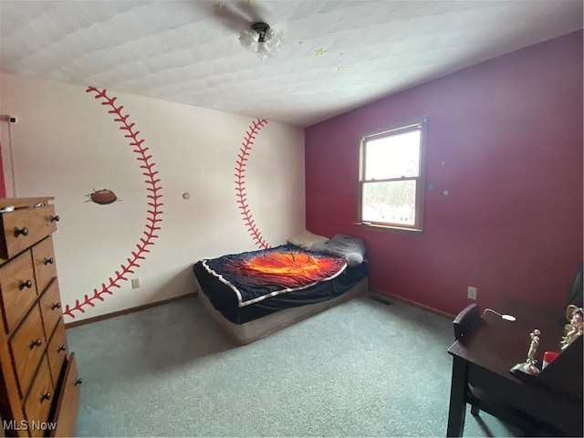 bedroom with baseboards and carpet flooring