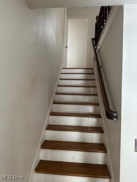 stairway with baseboards