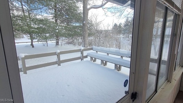 view of snow covered deck