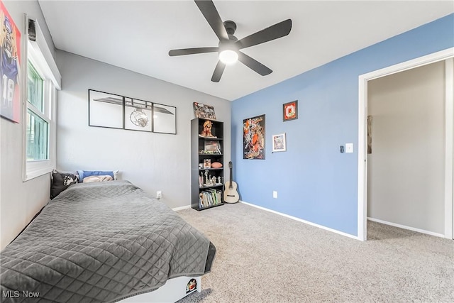 bedroom featuring carpet flooring, ceiling fan, and baseboards