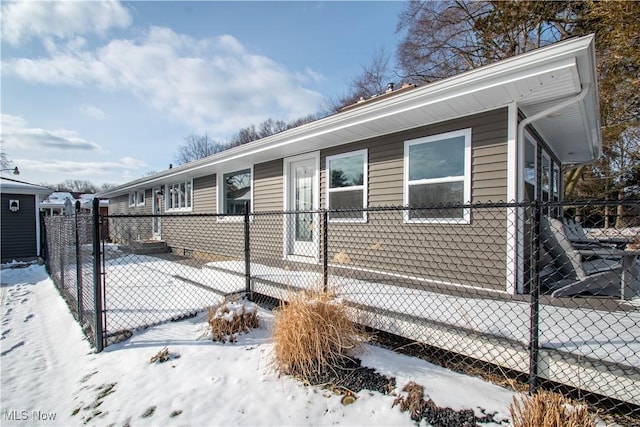 view of front of home with fence