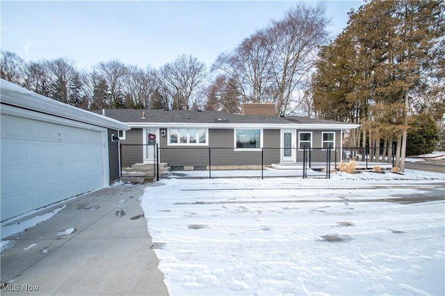 ranch-style home with an attached garage