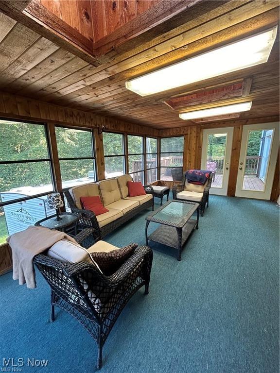 sunroom / solarium with wood ceiling