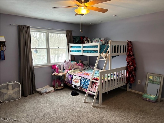 carpeted bedroom with a ceiling fan