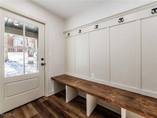 mudroom with dark wood-style flooring