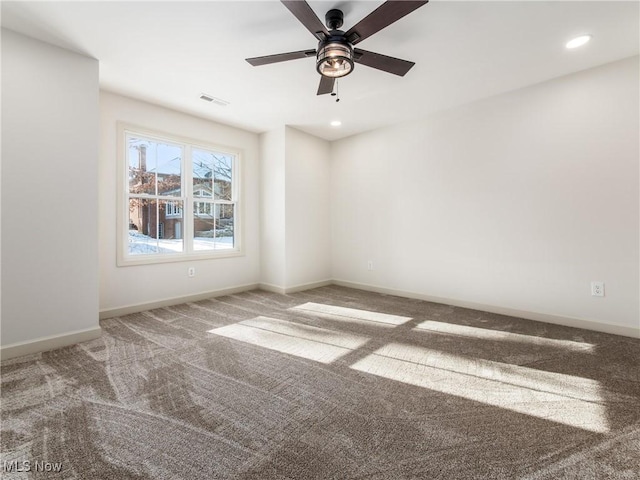 spare room featuring visible vents, baseboards, ceiling fan, carpet floors, and recessed lighting