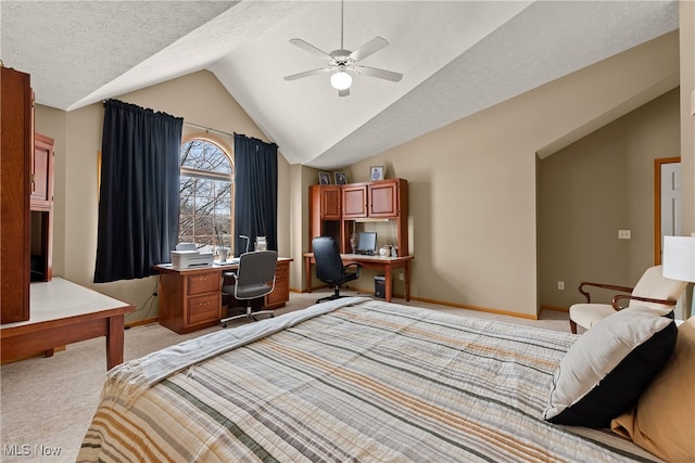 bedroom with light carpet, vaulted ceiling, a textured ceiling, and baseboards