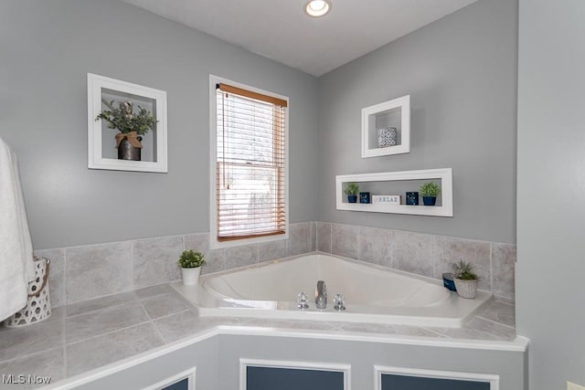 full bathroom featuring a bath