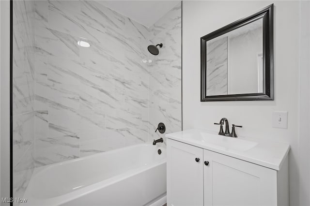 bathroom with shower / tub combination and vanity