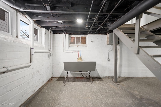 below grade area featuring a sink