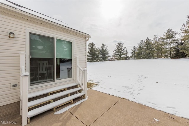 view of snow covered patio