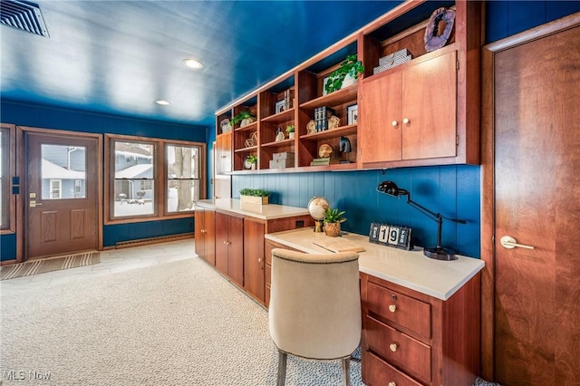 home office featuring recessed lighting, visible vents, and built in study area