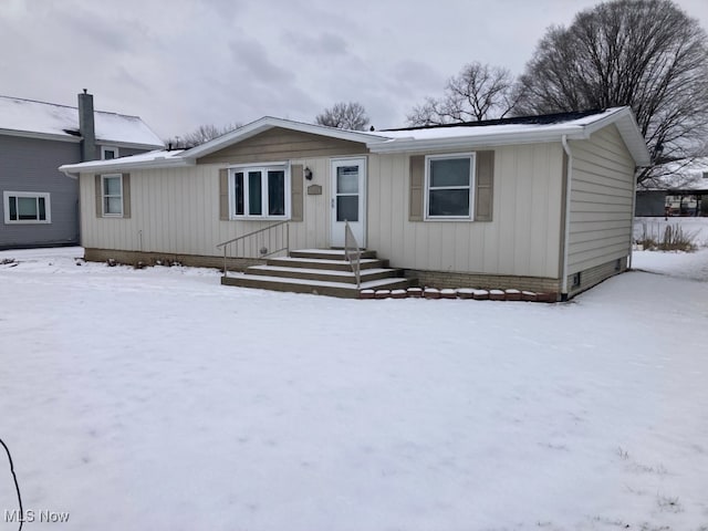 view of front of property with crawl space