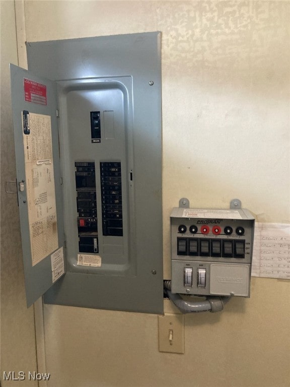 utility room featuring electric panel