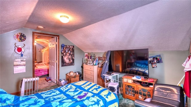 carpeted bedroom featuring radiator heating unit, vaulted ceiling, and a textured ceiling