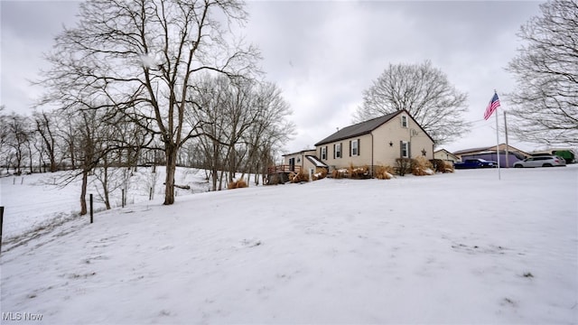 view of snow covered property