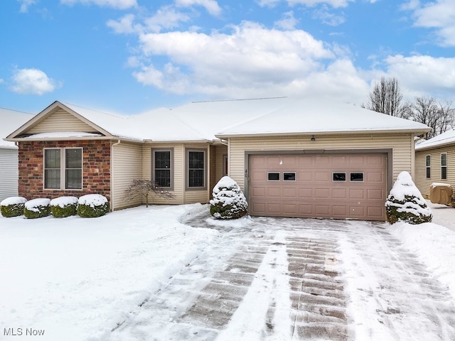 single story home with an attached garage