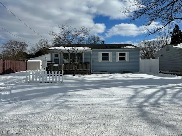 view of front of house with fence