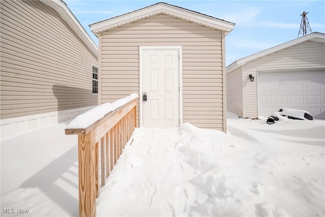 property entrance with a garage