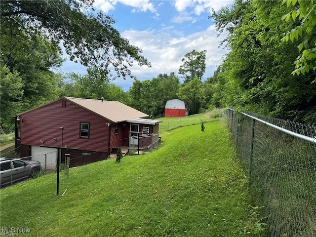 920 Caywood Rd, Marietta, OH 45750 - view of yard with a garage and fence