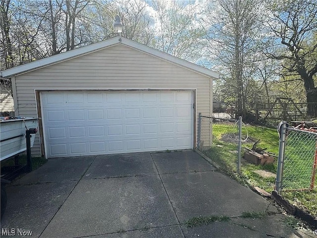 detached garage with fence