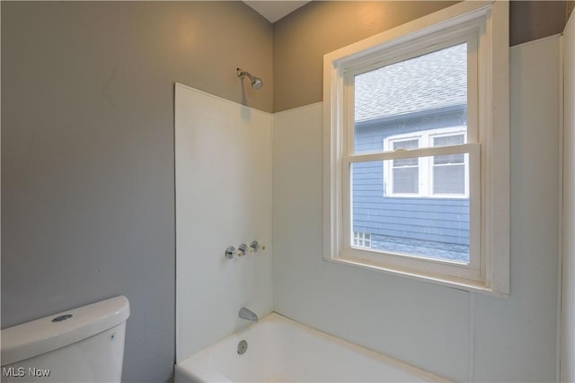 full bathroom with shower / bath combination and toilet