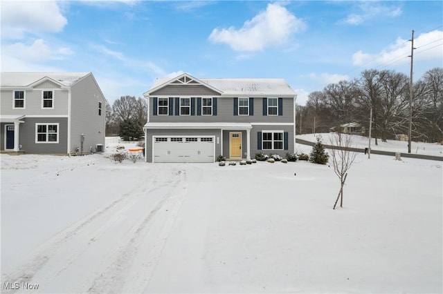 view of front of home with a garage