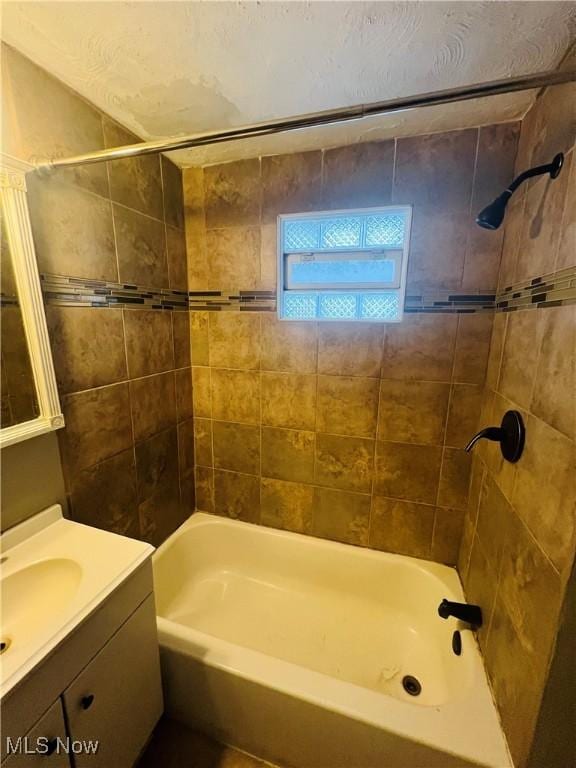 full bath with tub / shower combination and vanity