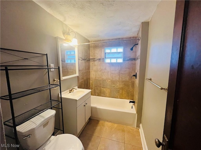 full bathroom with toilet, tile patterned flooring, bathtub / shower combination, a textured ceiling, and vanity