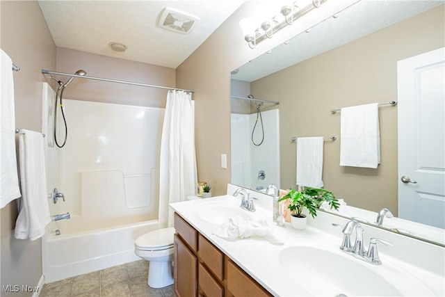 full bath featuring shower / bath combination with curtain, visible vents, a sink, and toilet