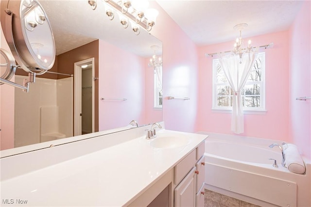 bathroom featuring a shower, an inviting chandelier, vanity, tile patterned flooring, and a bath