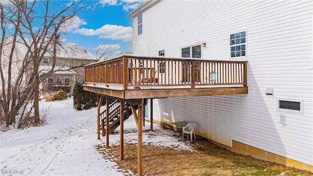 view of snow covered deck