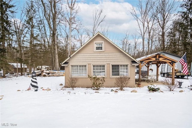 view of front of property with a gazebo