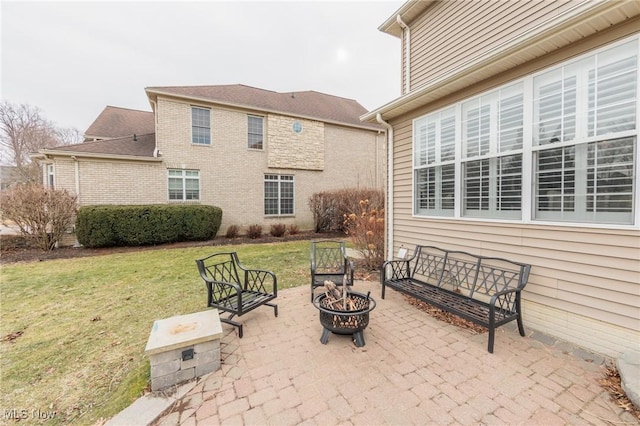 view of patio featuring an outdoor fire pit