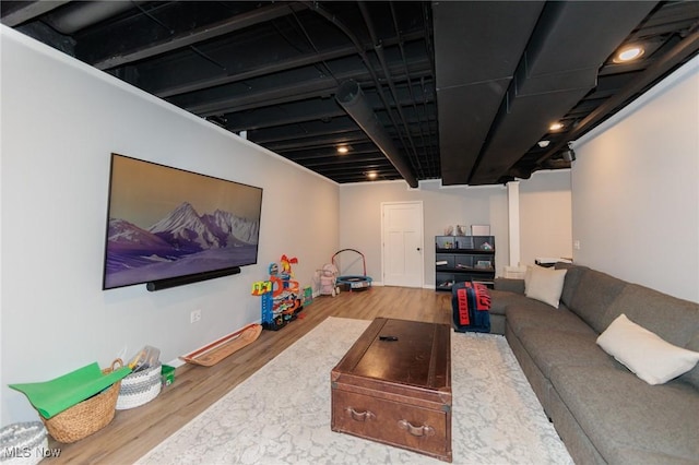 living area with wood finished floors