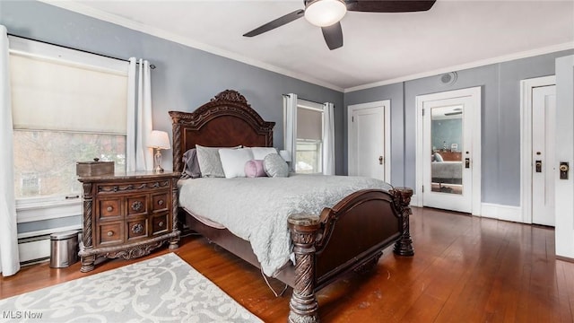 bedroom with ornamental molding, dark wood-style flooring, and ceiling fan