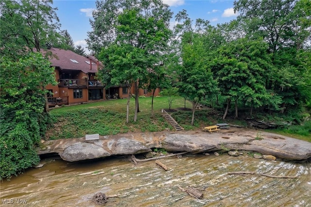 view of yard with a water view