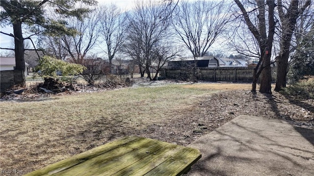 view of yard featuring fence