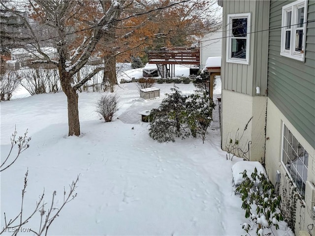 view of yard layered in snow