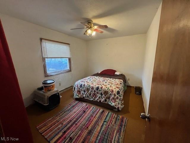 bedroom featuring ceiling fan